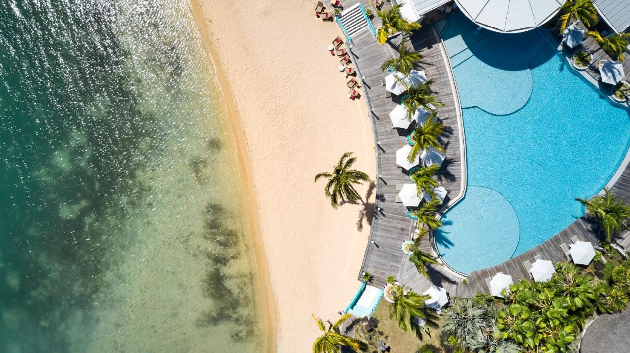 ホテル ラックス グランド ガウブ グラン・ゴーブ エクステリア 写真 Aerial view of the pool and beach at the Sheraton Maldives Resort & Spa